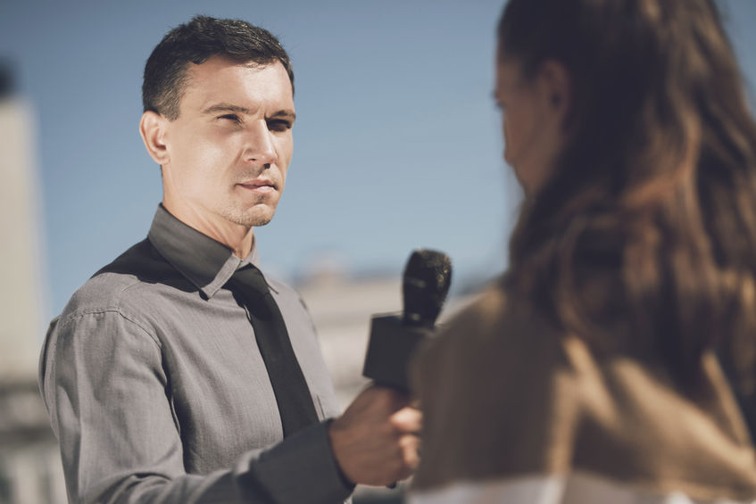 reporter interviewing someone